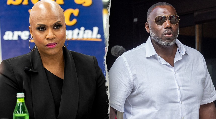 Congressman's Husband Knocks Phone From Reporter's Hand During Childcare Fraud Question